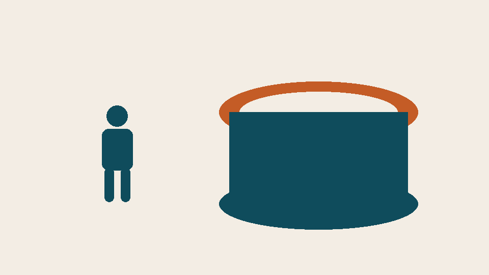 Silhouette of a person at a drum